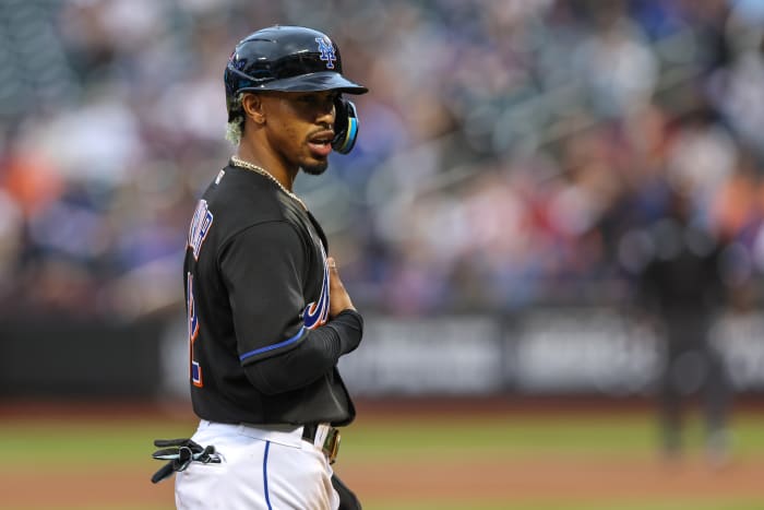 Francisco Lindor stands on base after a hit.